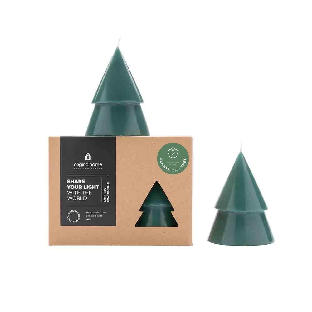 Two forest green Christmas tree-shaped candles shown next to its brown kraft paper packaging box, with the candle standing on top of and next to the box on a white background.