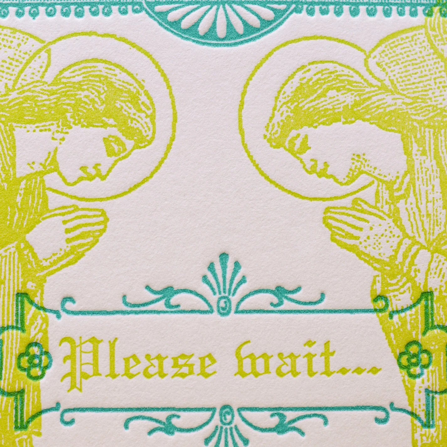 A close up of an art print card with an off white background, featuring two praying angel figures in yellow-green outline and teal decorative flourishes. The center reads 'Please wait'.