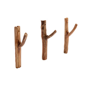 Three wooden branch-style towel hooks on a white background