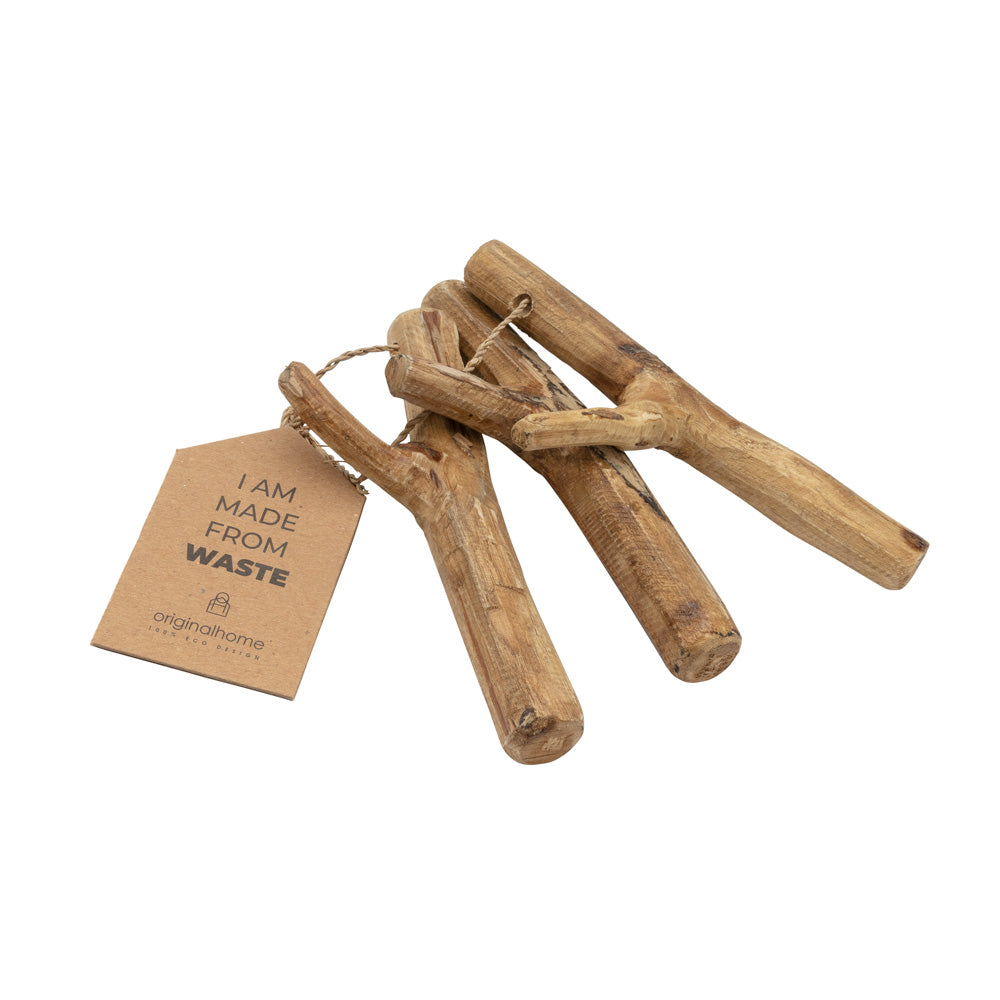 Three rustic wooden branch-style towel hooks, tied together with twine and a small kraft paper tag that reads 'I AM MADE FROM WASTE', on a plain white background.