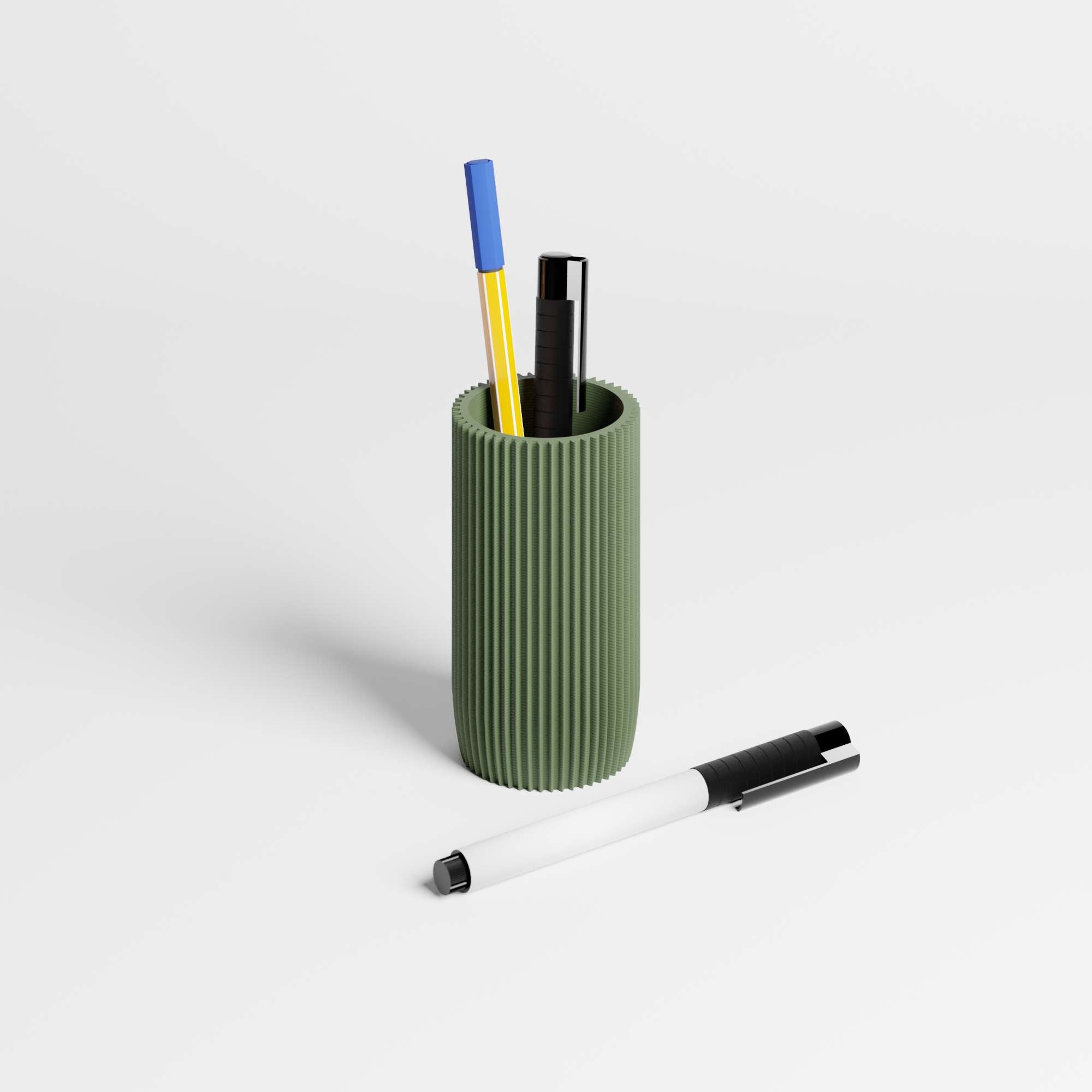 Olive green ribbed pen holder with pens on a light gray background